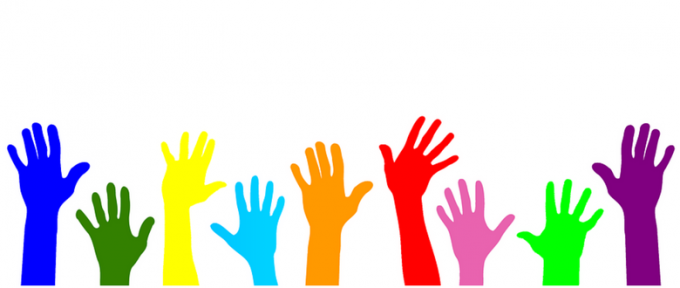 colourful graphic of hands in the air to volunteer