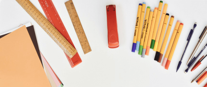 rulers stapler pens and paper