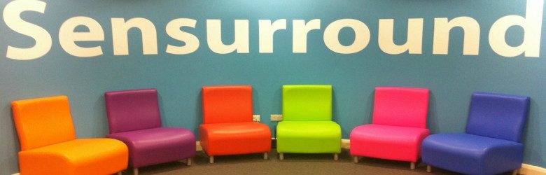 colourful chairs and senurround sign redbank house