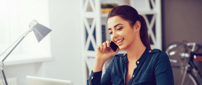 woman relaxed on the telephone in office