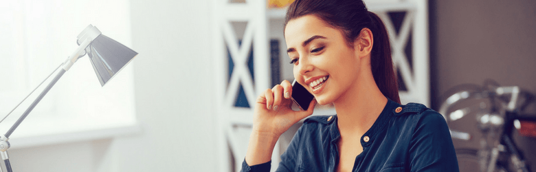 woman relaxed on the telephone in office