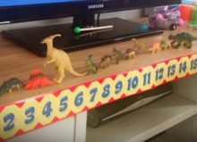 toy animals and numbers in a row