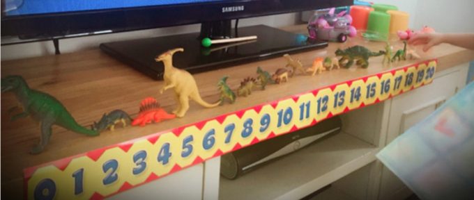 toy animals and numbers in a row