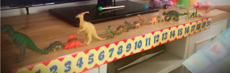 toy animals and numbers in a row