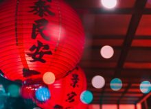 chinese latern hanging from ceiling with spotlights