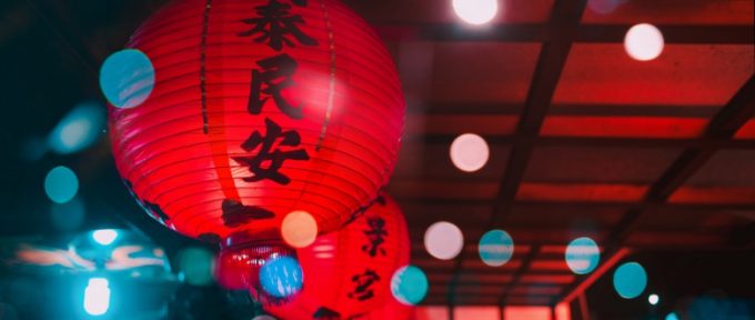 chinese latern hanging from ceiling with spotlights