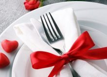 valentines meal table setting with ribbon on fork