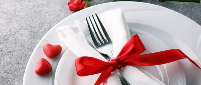 valentines meal table setting with ribbon on fork