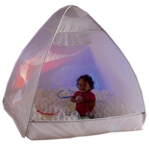 child inside sensory ball house