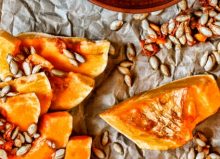 pumpkin seeds and wooden spoon