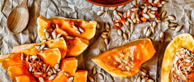 pumpkin seeds and wooden spoon