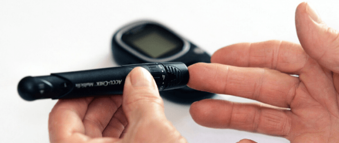 Diabetic person checking their blood sugar